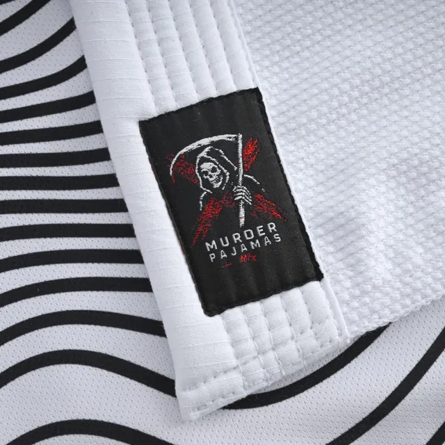 Reaper label on the striped inner lining of the white gi